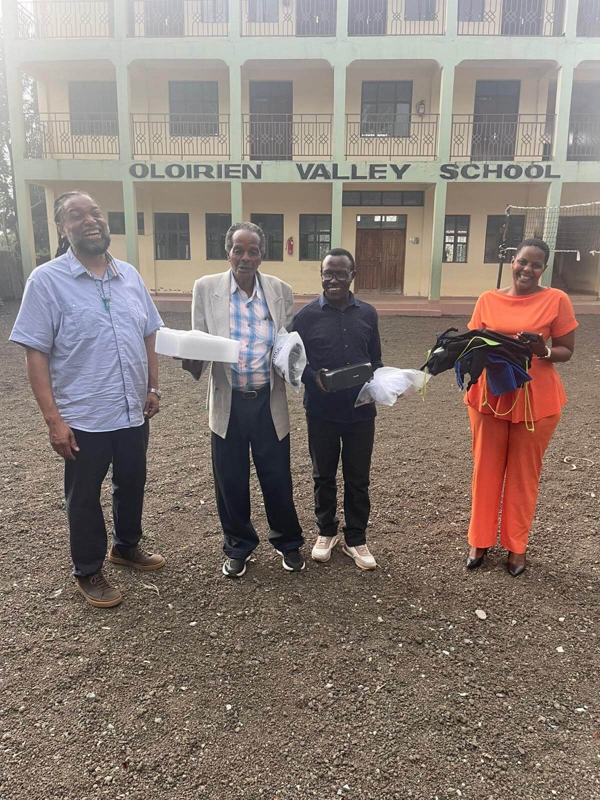 Delivering donated learning materials at Olorien Valley School